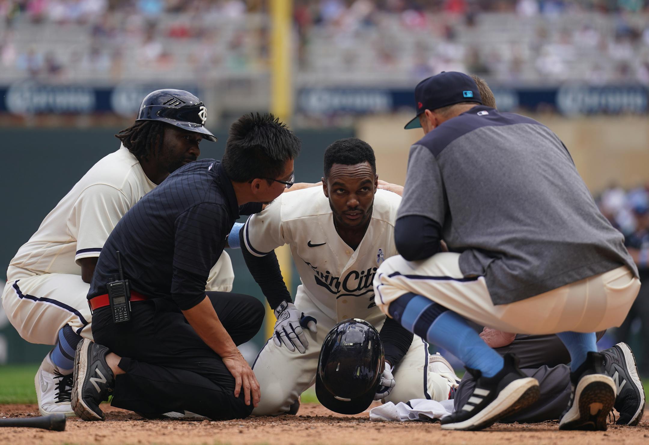 Minnesota Twins center fielder Michael A. Taylor (2) is hit in the head in the 8th inning.