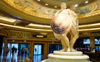 Advertisements for the upcoming film "Gladiator II" hang from statues on the opening day of CinemaCon 2024 at Caesars Palace, Monday, April 8, 2024, i