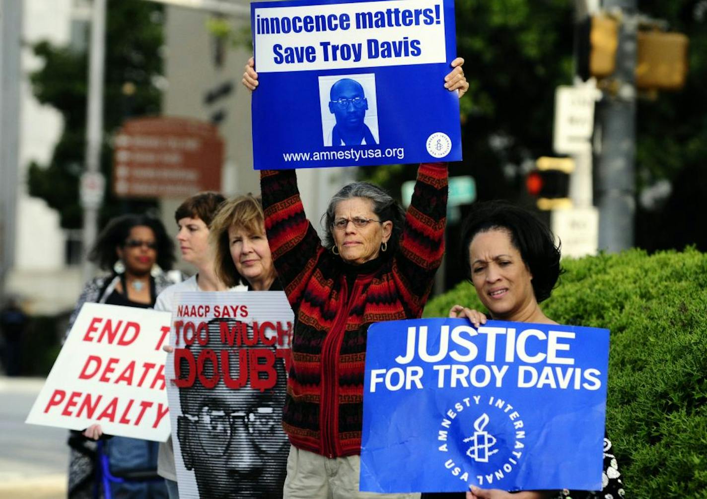 Protesters gathered Tuesday in support of death row inmate Troy Davis outside the Georgia Board of Pardons and Paroles in Atlanta.