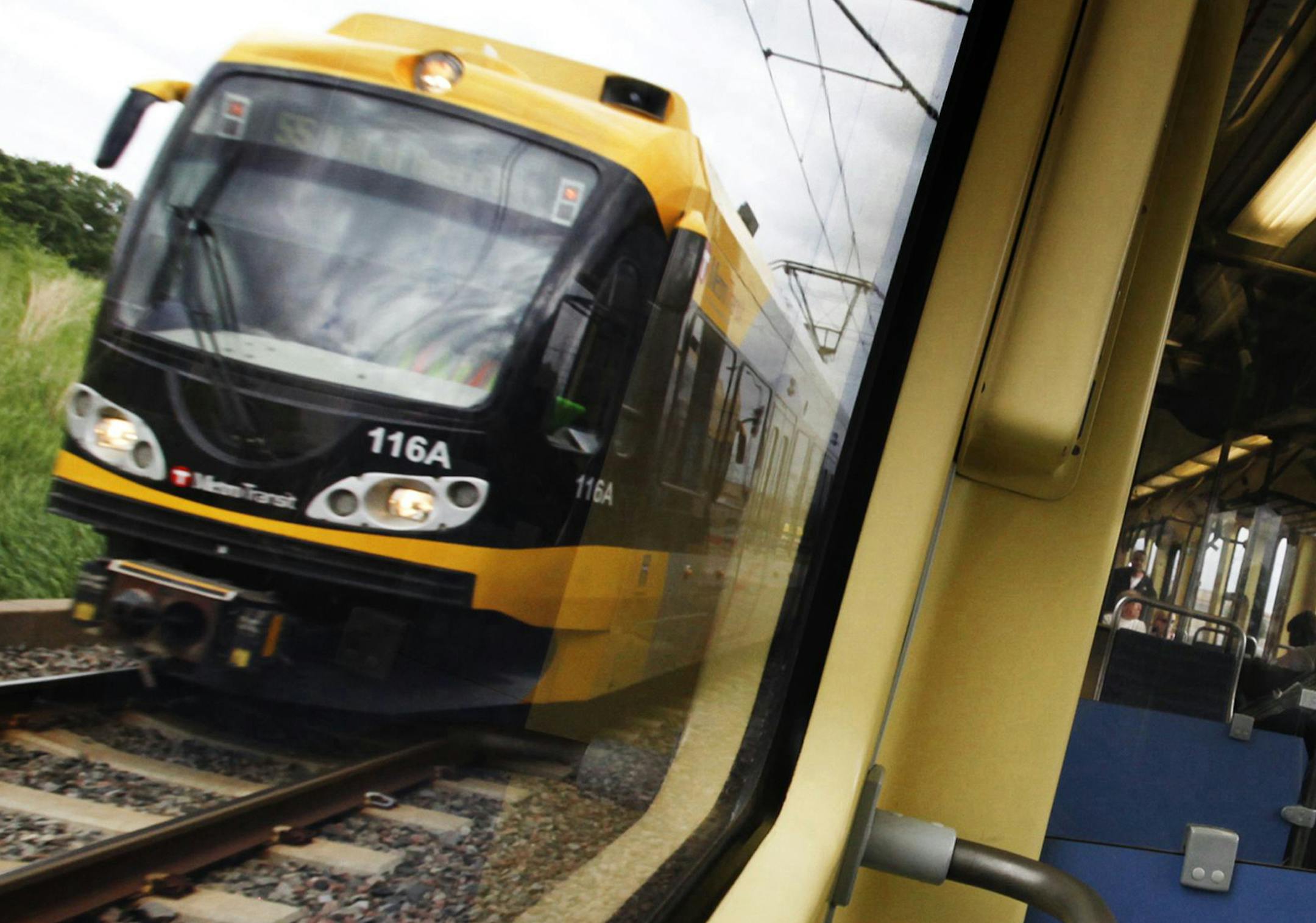 DAVID JOLES ‚Ä¢ djoles@startribune.com -June 2, 2011- Minneapolis, MN- In this photo:] Riders take the light-rail during morning rush hour. Once derided as a ‚Äútrain to nowhere," the Hiawatha light-rail line carries enough riders over 12 miles that it's cheaper to run than city buses. The daily cost per passenger mile of operating the Hiawatha between Bloomington and downtown Minneapolis is nearly half that of metro buses throughout the Twin Cities, according t
