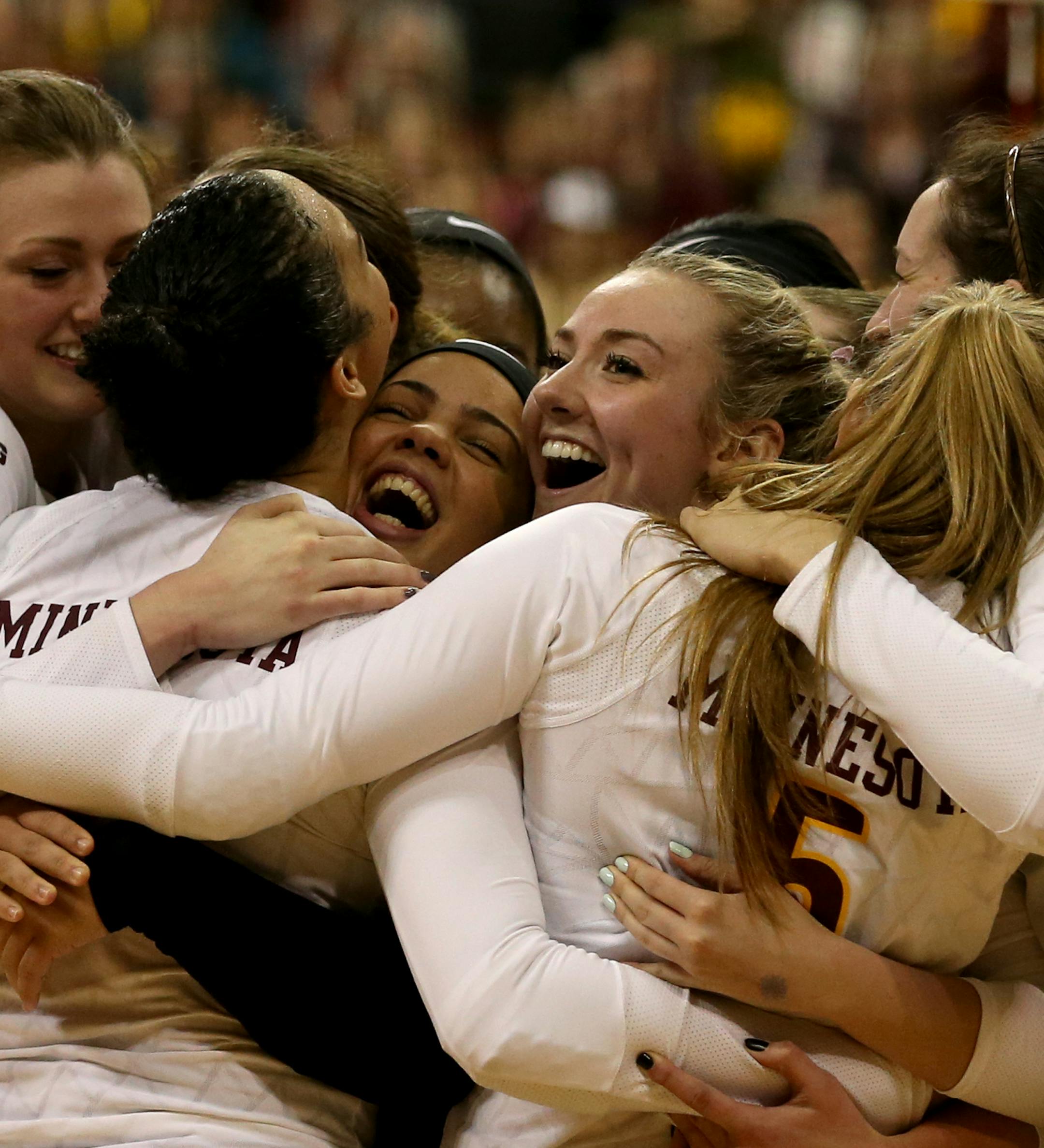Gopher team celebrated after their win against Ohio State in 5 sets. ] (KYNDELL HARKNESS/STAR TRIBUNE) kyndell.harkness@startribune.com Gophers vs Ohio State in volleyball at the Sports Pavilion in Minneapolis Min., Wednesday November 25, 2015. Gophers won over Ohio State 3-2.