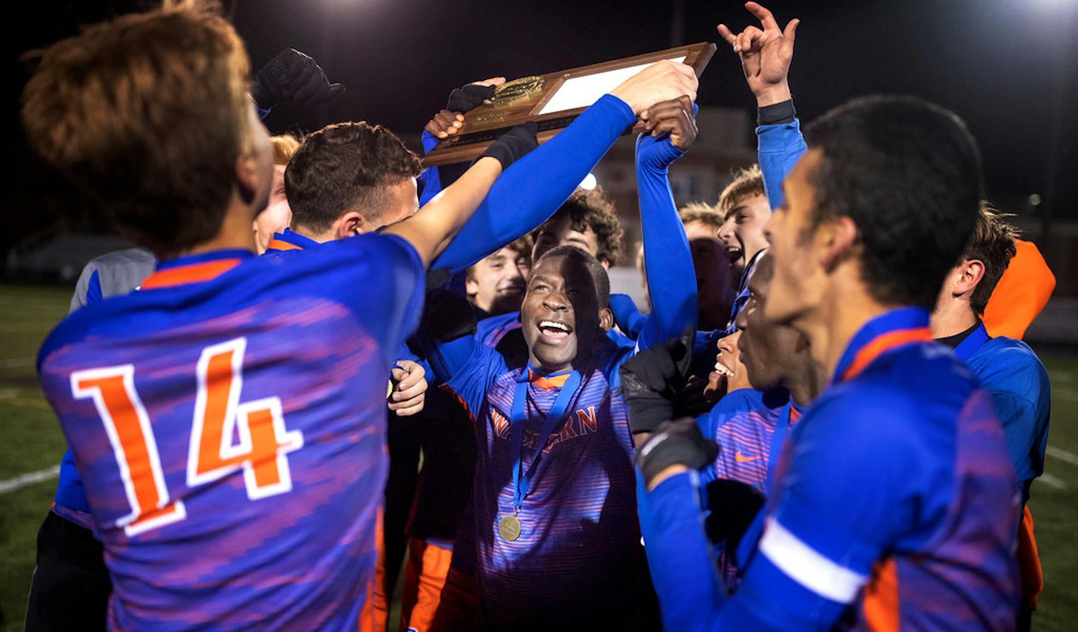 Washburn celebrated its Section 6 soccer title after beating Hopkins earlier this month.