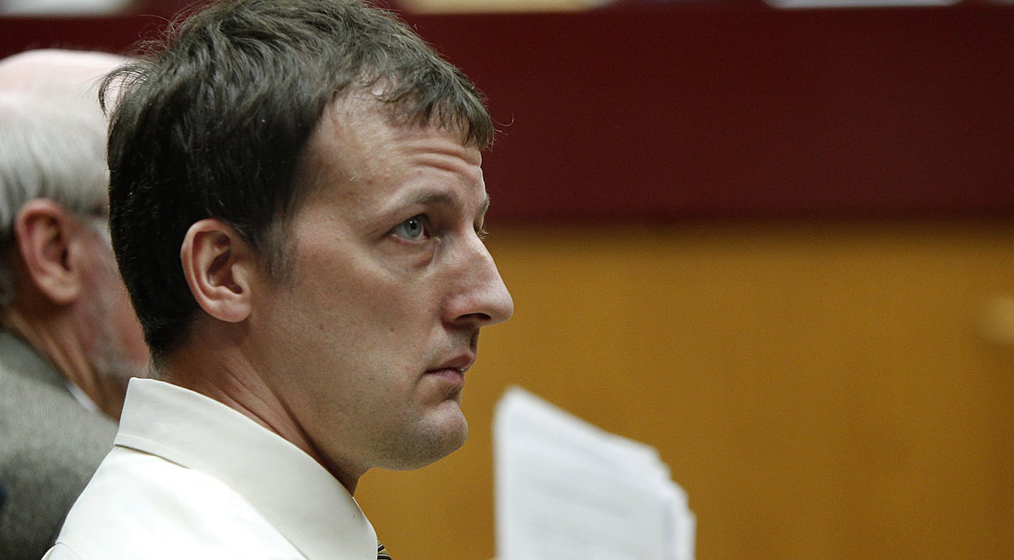 Aaron Schaffhausen watches the jury leave the courtroom after closing arguments in his case in Hudson, Wisconsin, Tuesday, April 16, 2013. Jurors rejected his insanity defense after he pleaded guilty to killing his three daughters: 11-year-old Amara, 8-year-old Sophie and 5-year-old Cecilia. (Elizabeth Flores/Minneapolis Star Tribune/MCT) ORG XMIT: MIN1304162055390988