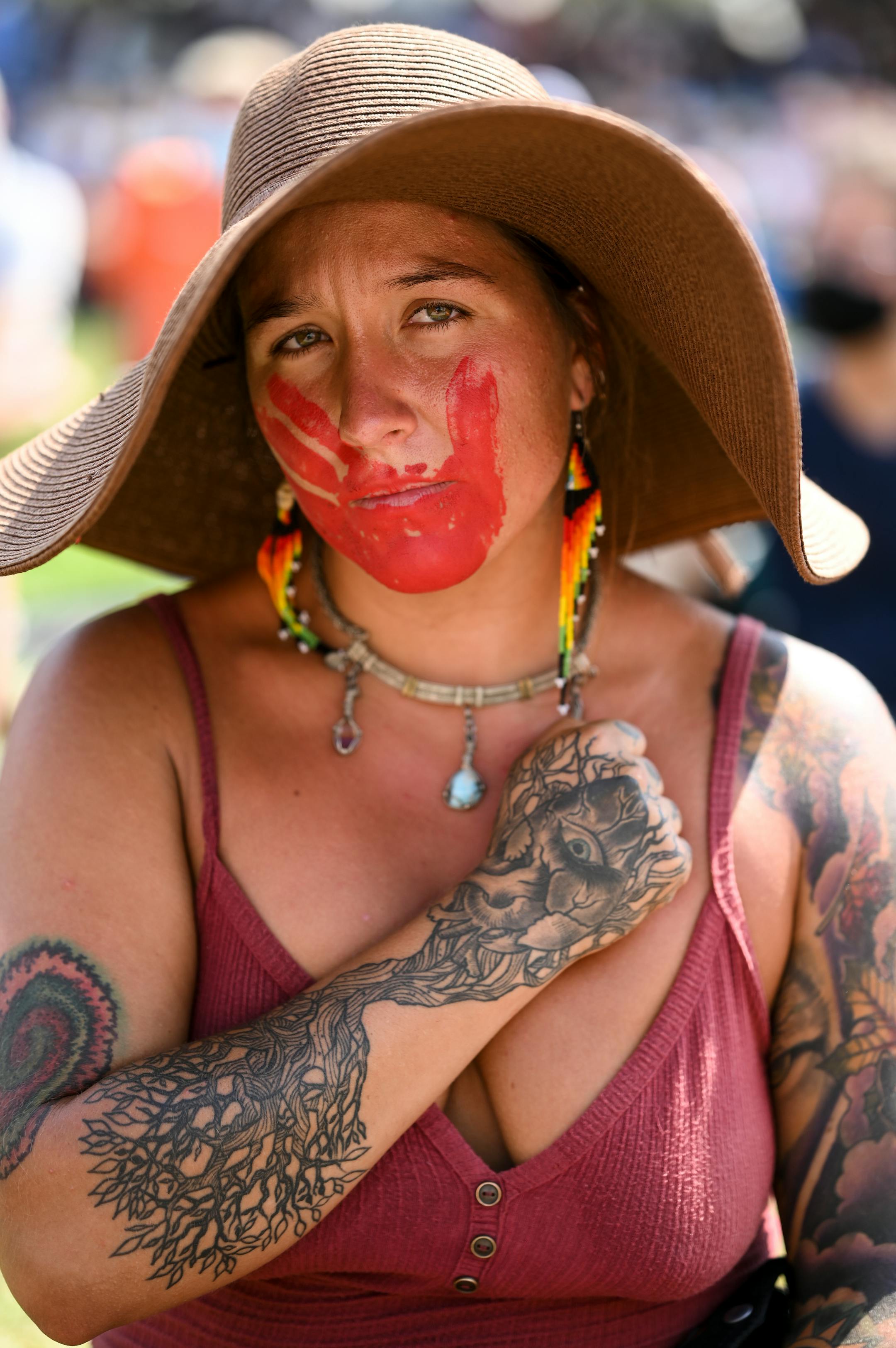 Sarah Perez, with the Kizh Nation in California, sat for a portrait during the Stop Line 3 protest outside the Minnesota State Capitol Wednesday.