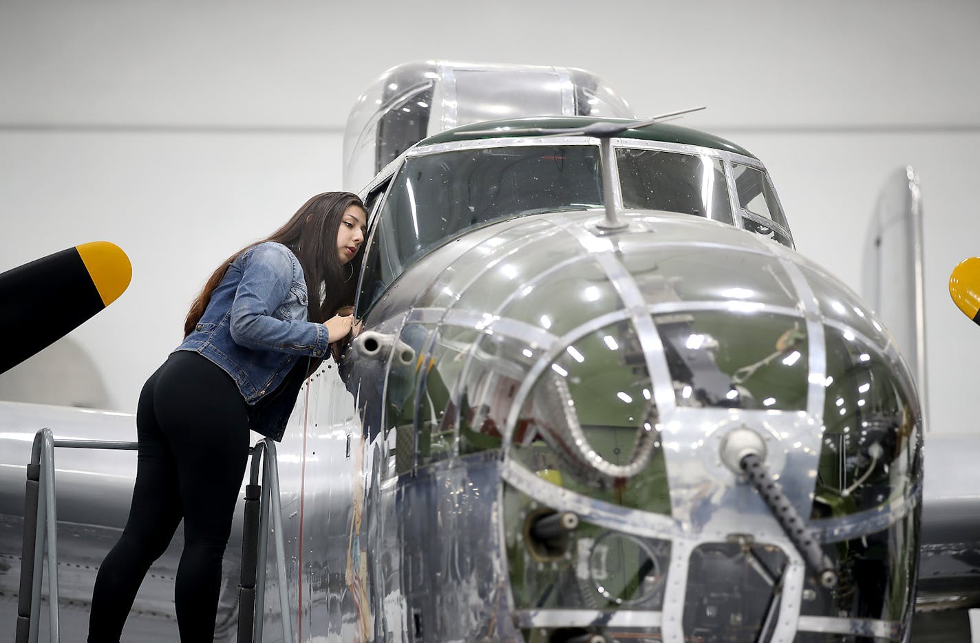 Chaska Integrated Arts Academy student Samantha Navarro got a closer look at the B-25 Mitchell at the Wings of the North Air Museum, Friday, January 20, 2017 in Eden Prairie, MN. ] (ELIZABETH FLORES/STAR TRIBUNE) ELIZABETH FLORES &#x2022; eflores@startribune.com