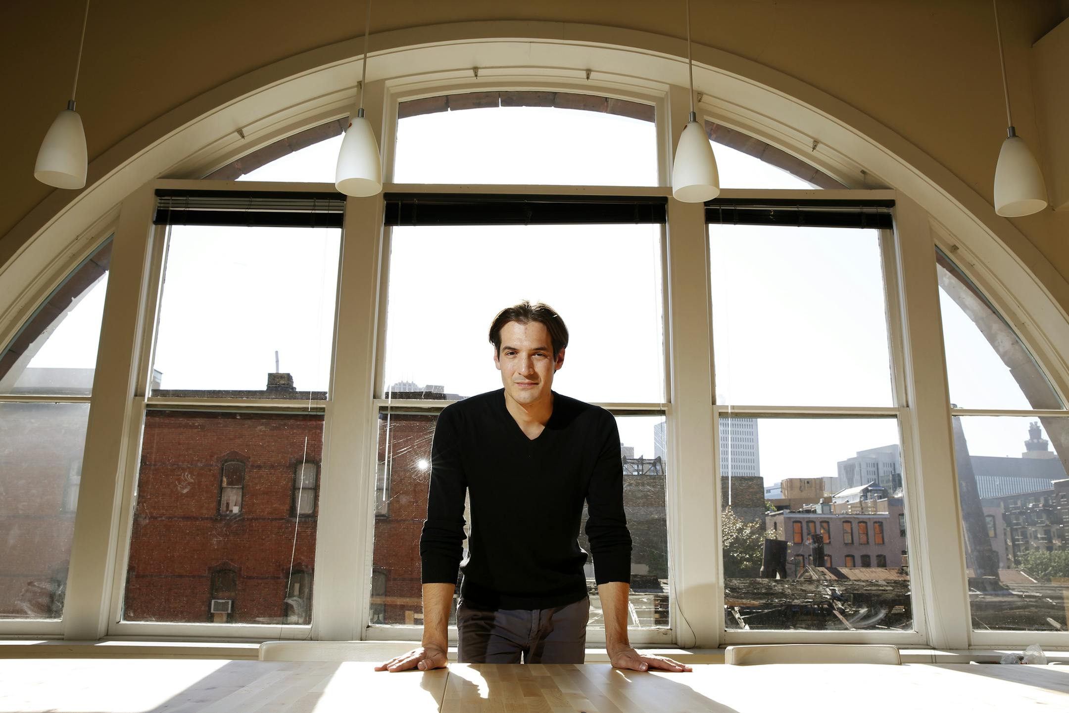 Peter Kane runs the startup Healthcare.mn and Start Up Venture Loft, a co-working space in Minneapolis, Minn. on Tuesday, September 16, 2014. ] LEILA NAVIDI leila.navidi@startribune.com / BACKGROUND INFORMATION: Kane is developing a supportive community for start up ventures in Minneapolis through the co-working space and regular meetings and presentations for startups.