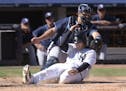 New York Yankees' John Ryan Murphy (66) scores on a double by Didi Gregorius ahead of the tag by Tampa Bay Rays catcher Luke Maile during the fifth in