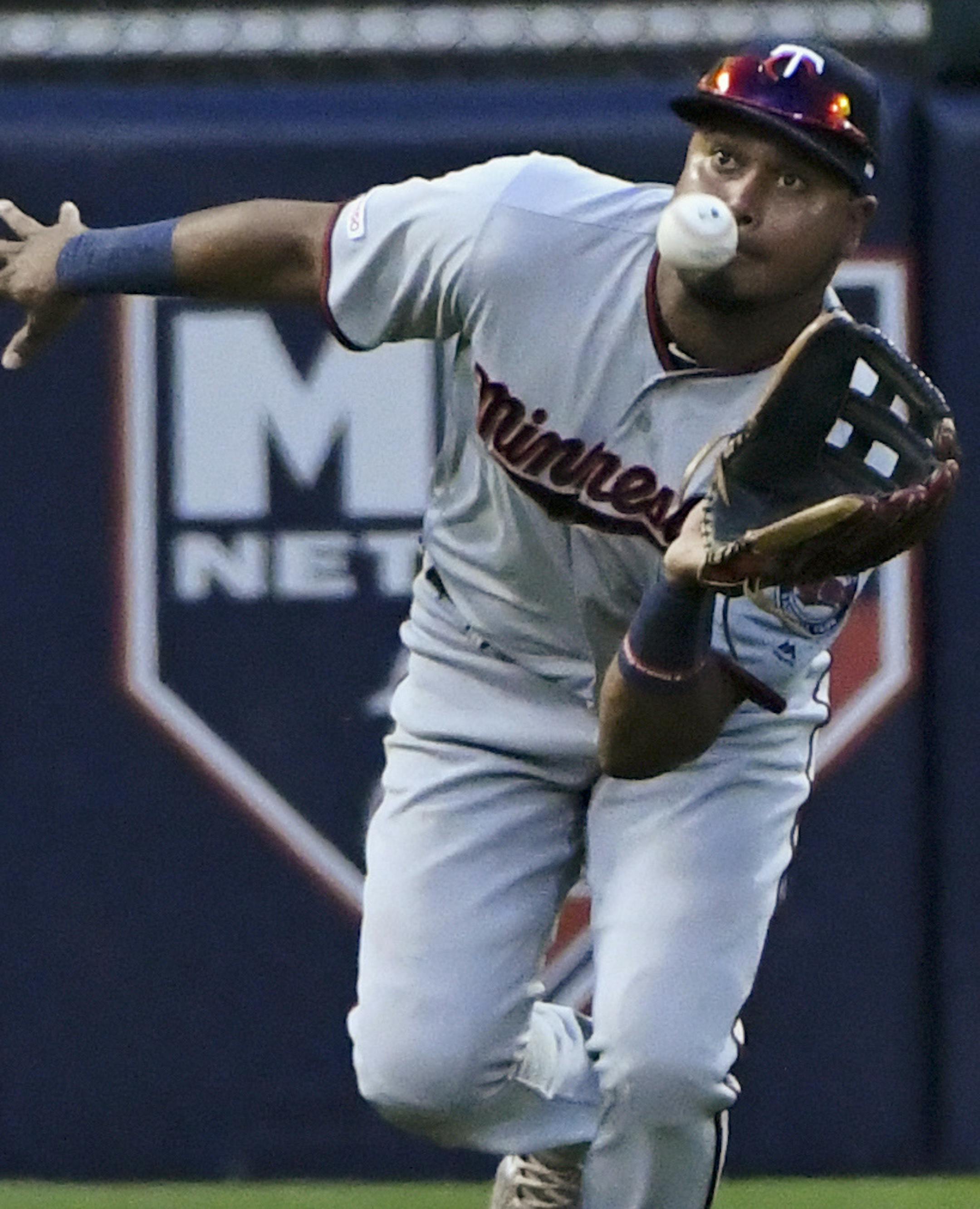 Minnesota Twins left fielder Luis Arraez catches a fly ball hit by Chicago White Sox's Yolmer Sanchez during the fifth inning of a baseball game Friday, June 28, 2019, in Chicago. (AP Photo/Matt Marton)