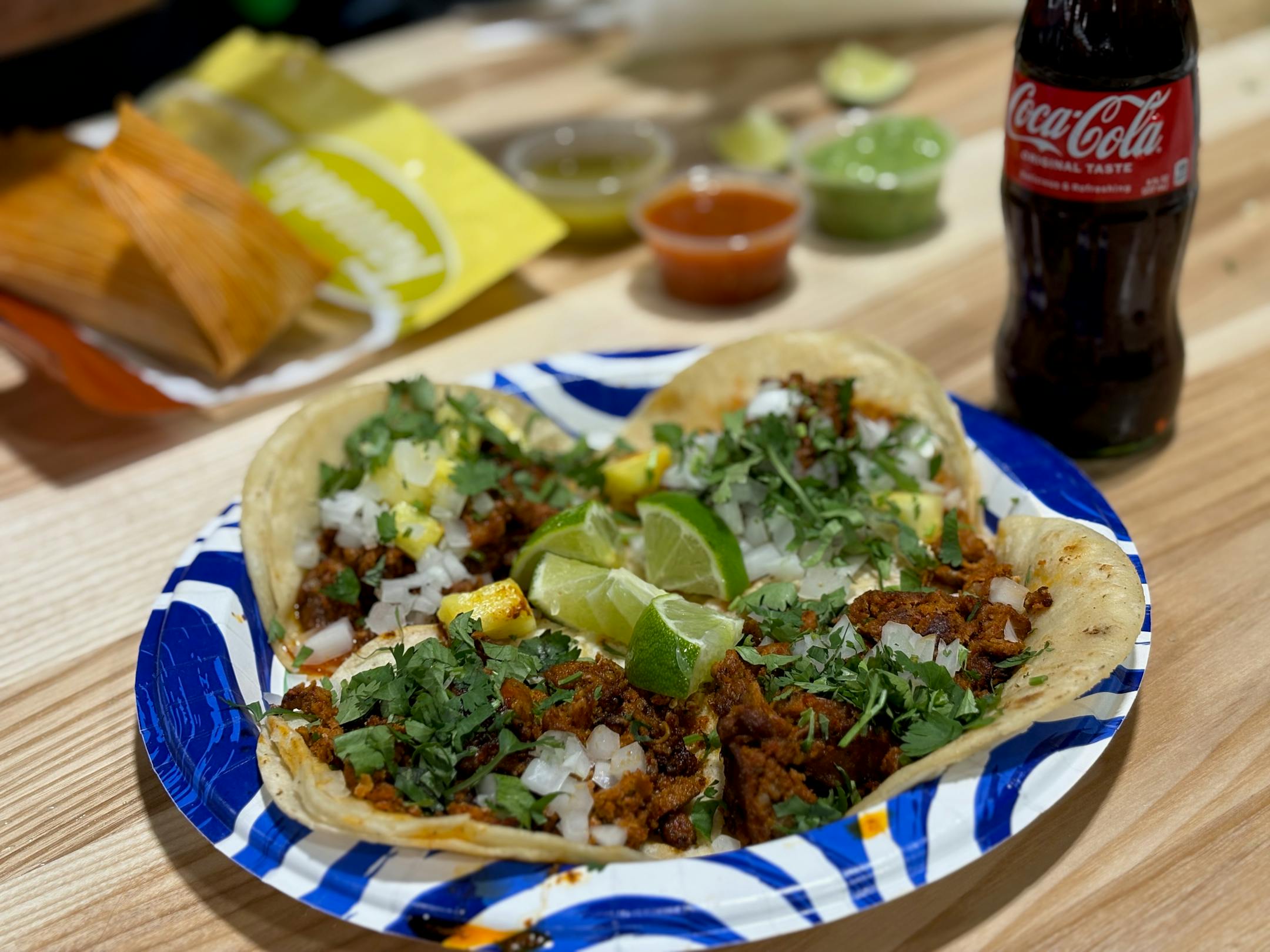 Lomabonita tacos, tamales and a Mexican Coke inside the new supermercado's dining area in Richfield.