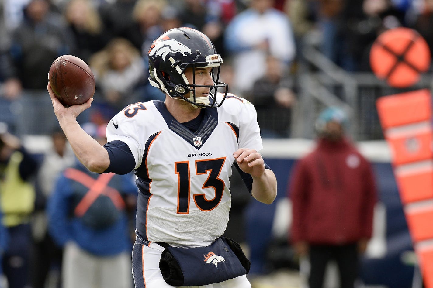 Denver Broncos quarterback Trevor Siemian passes against the Tennessee Titans in the first half of an NFL football game Sunday, Dec. 11, 2016, in Nashville, Tenn. (AP Photo/Mark Zaleski)