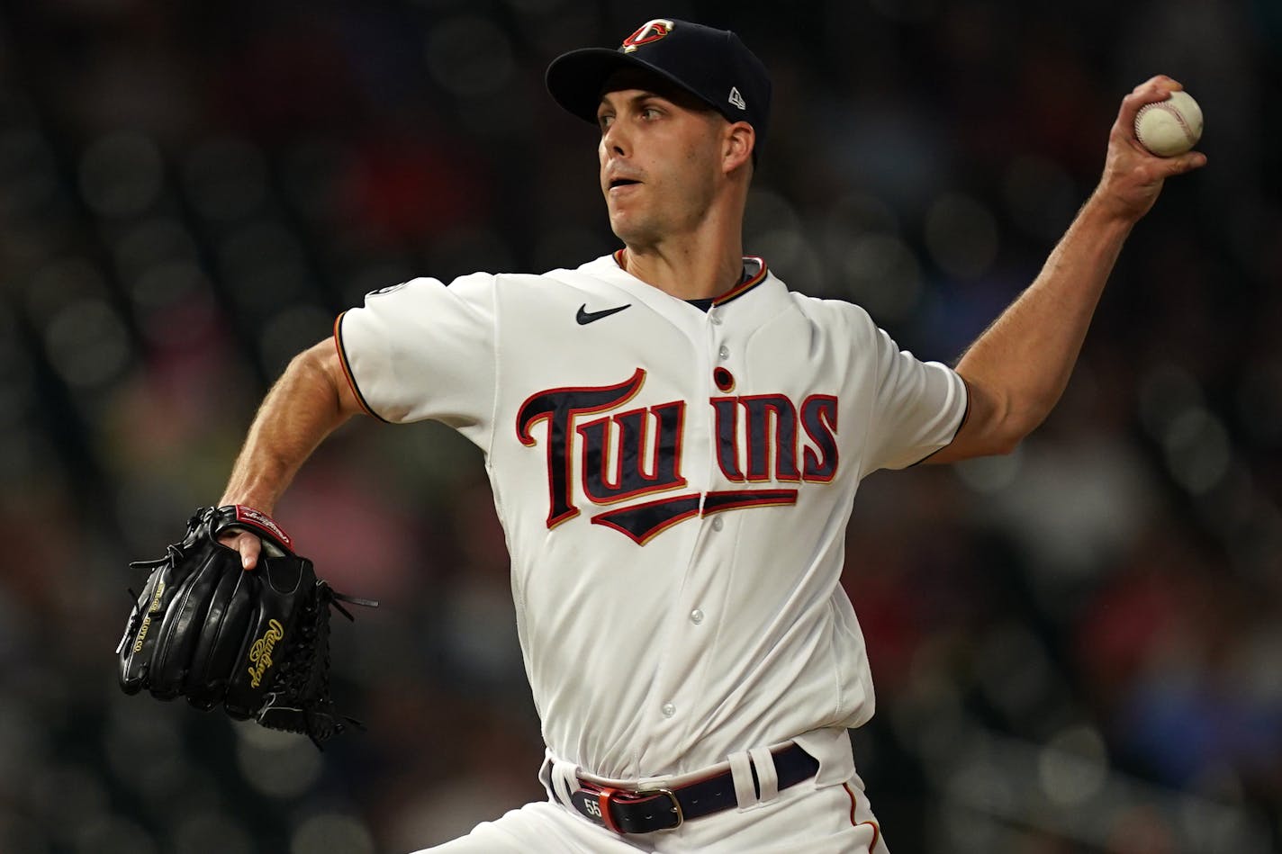 Bugs swarmed over Minnesota Twins relief pitcher Taylor Rogers (55) delivered a pitch from the mound in the eighth inning. ] ANTHONY SOUFFLE • anthony.souffle@startribune.com