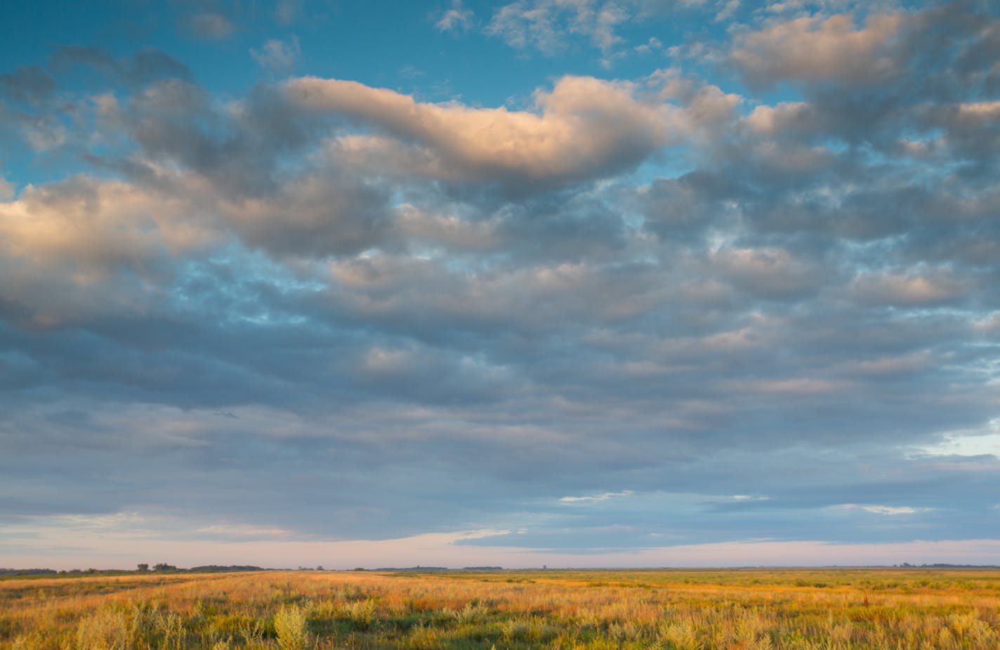 Prairie sunrise at Glacial Ridge National Wildlife Refuge. Glacial Ridge is located in Polk county in northwestern Minnesota. Courtesy U.S. Fish and Wildlife Service.