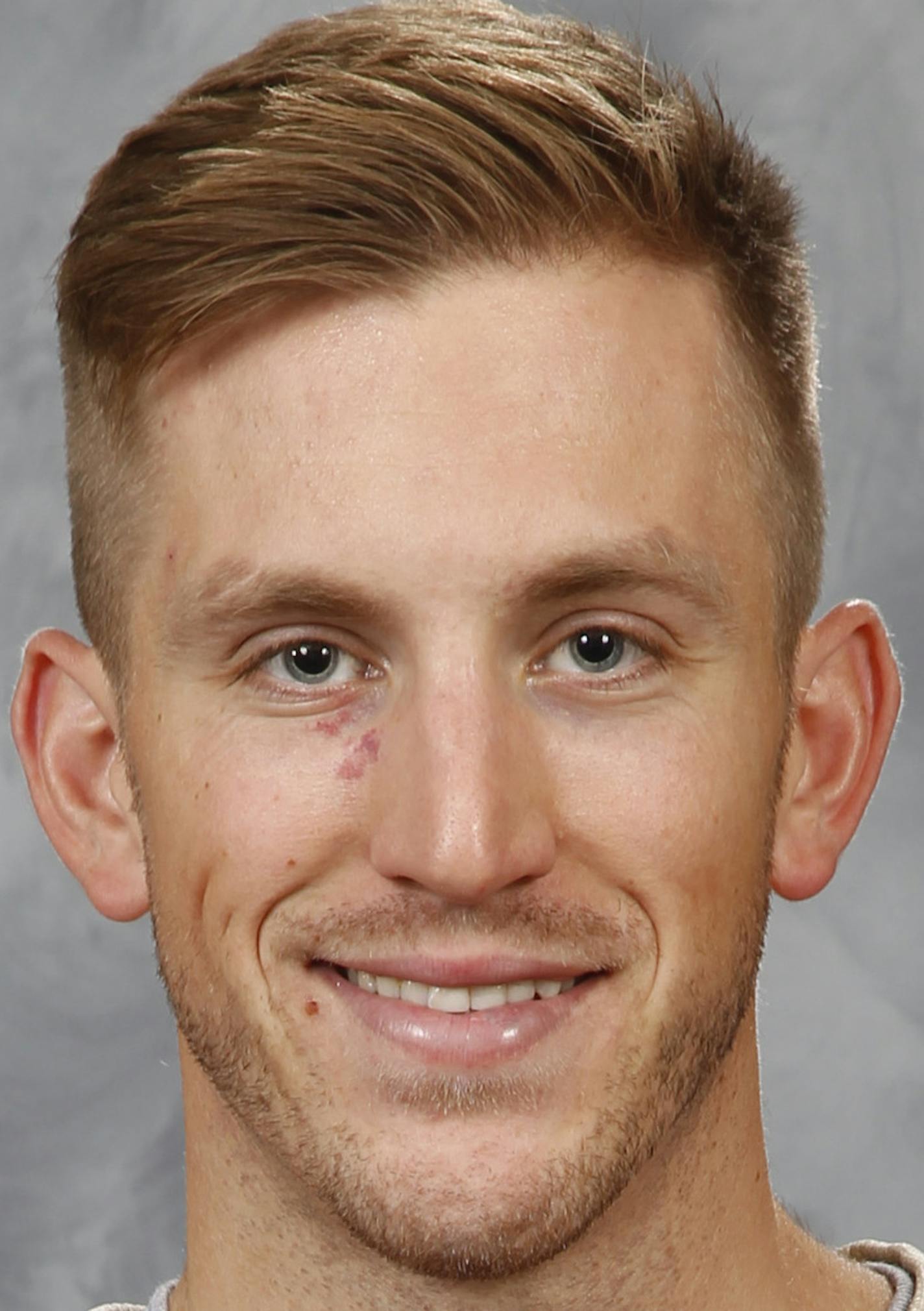 ST. PAUL, MN - SEPTEMBER 18: Jordan Schroeder #10 of the Minnesota Wild poses for his official headshot for the 2014-2015 season on September 18, 2014 at the Xcel Energy Center in St. Paul, Minnesota. (Eric Miller/NHLI via Getty Images) ORG XMIT: 503032693