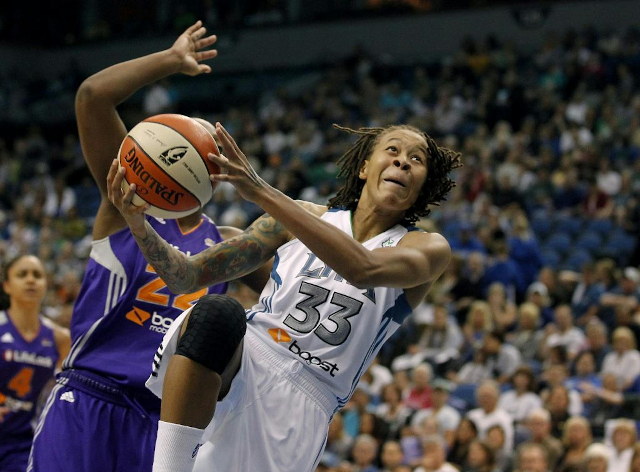 Seimone Augustus (right) has missed the past three games because of a sprained ankle but expects to be ready for the playoffs. The Lynx will enter the postseason as the dominant team in the WNBA.