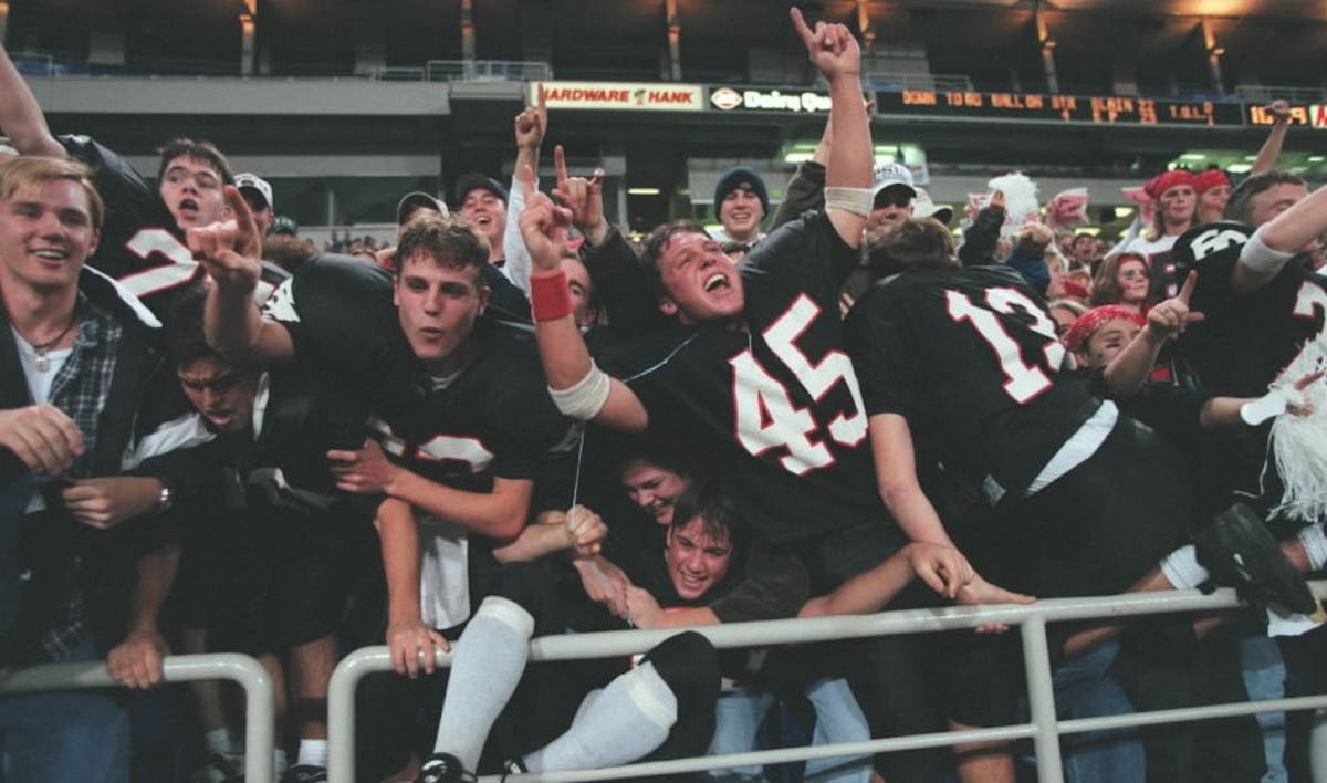 Eden Prairie players jumped into the stands at the conclusion of a close state championship game against Blaine in 1996.