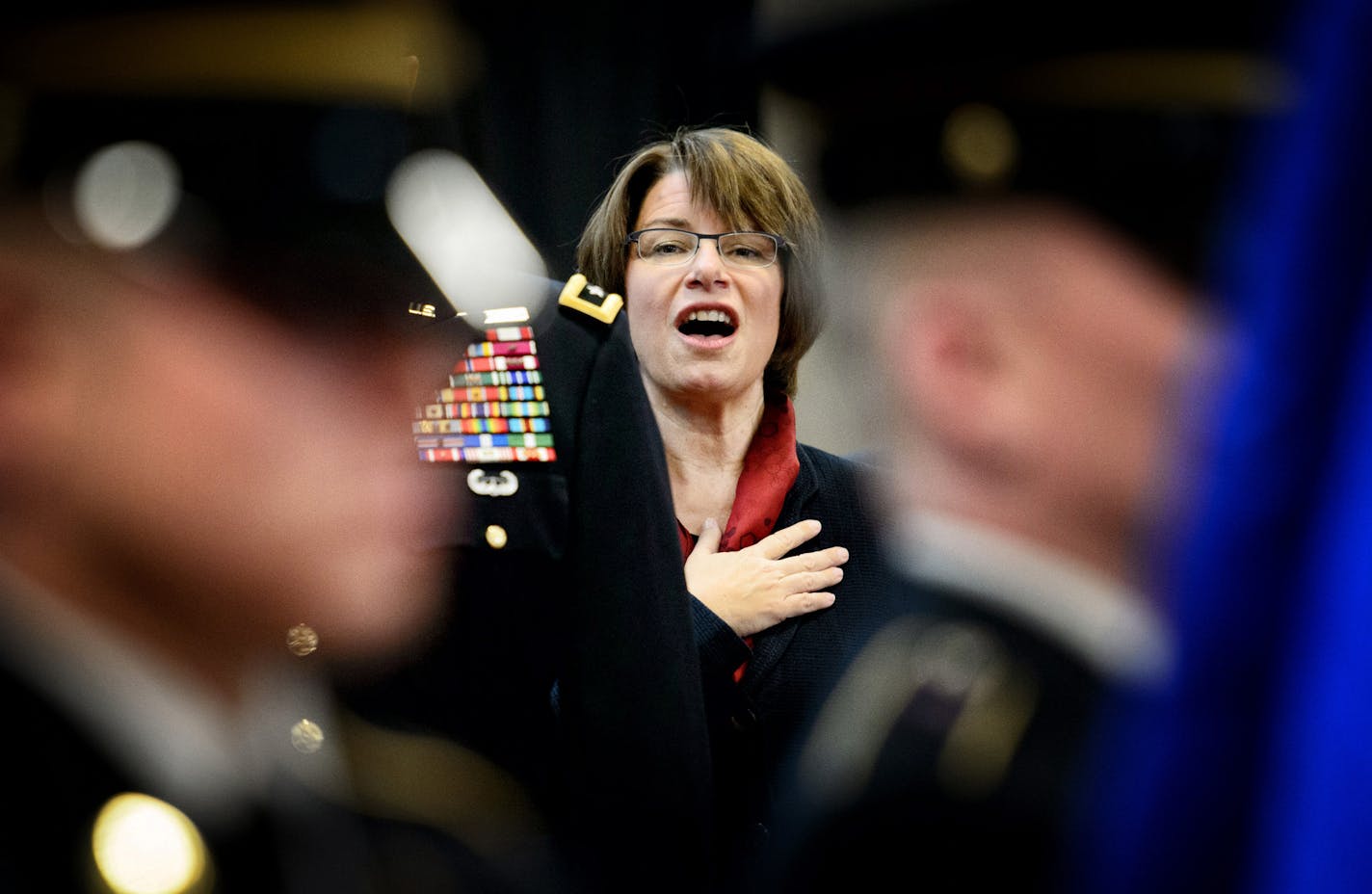 Senator Amy Klobuchar recited the Pledge of Allegiance at the start of the program. Minnesota Veterans Day program in Inver Grove Heights. ] GLEN STUBBE * gstubbe@startribune.com Tuesday, November 11, 2014 Minnesota Veterans Day program in Inver Grove Heights.