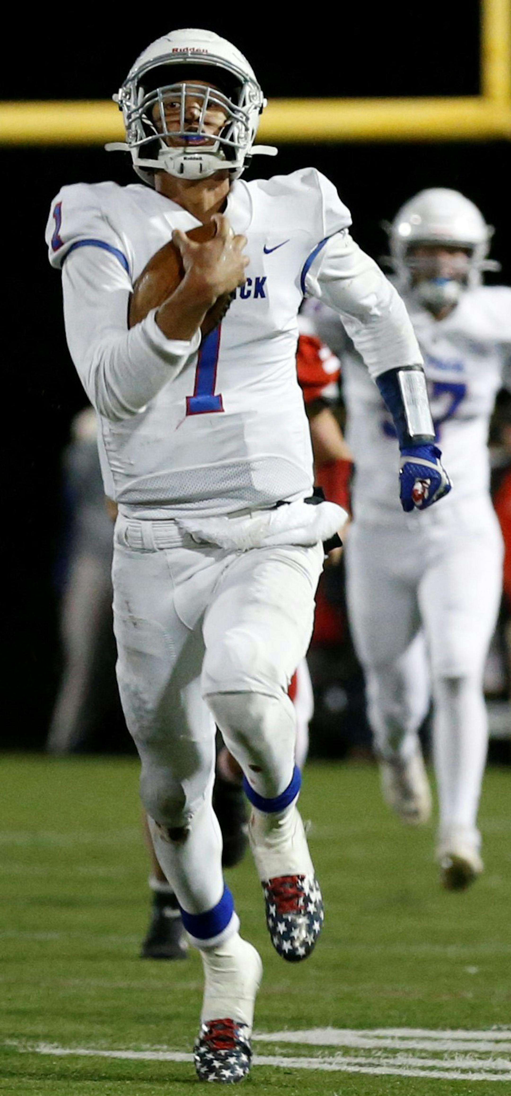 SMB quarterback Jalen Suggs (1) puts the Wolfpack in scoring position on a long gain with less than a minute to play against Benilde St. Margarets. The Wolfpack defeated the Red Knights 36-30 Friday night at Benilde High School. Photo by Jeff Lawler, SportsEngine