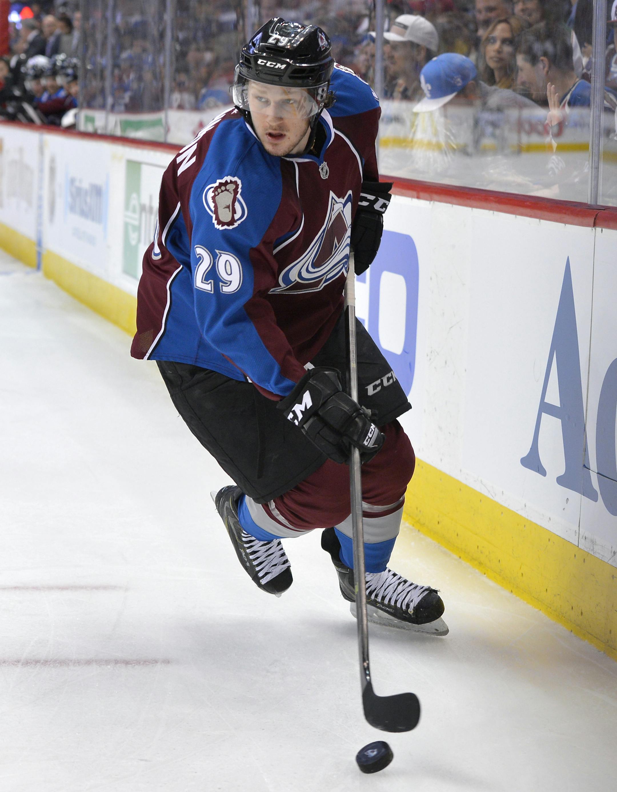 Colorado Avalanche center Nathan MacKinnon skates against the Minnesota Wild during the first period in Game 1 of an NHL hockey first-round playoff series on Thursday, April 17, 2014, in Denver. (AP Photo/Jack Dempsey) ORG XMIT: otk