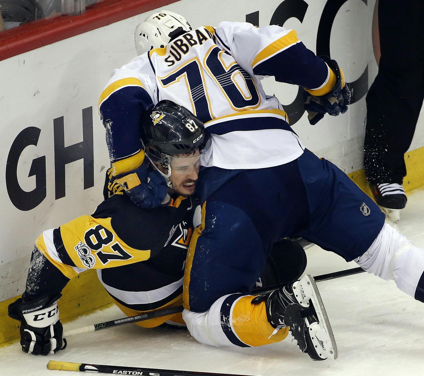 Nashville Predators' P.K. Subban (76) tangles with Pittsburgh Penguins' Sidney Crosby (87) during the first period in Game 5 of the NHL hockey Stanley Cup Final, Thursday, June 8, 2017, in Pittsburgh. (AP Photo/Gene J. Puskar)