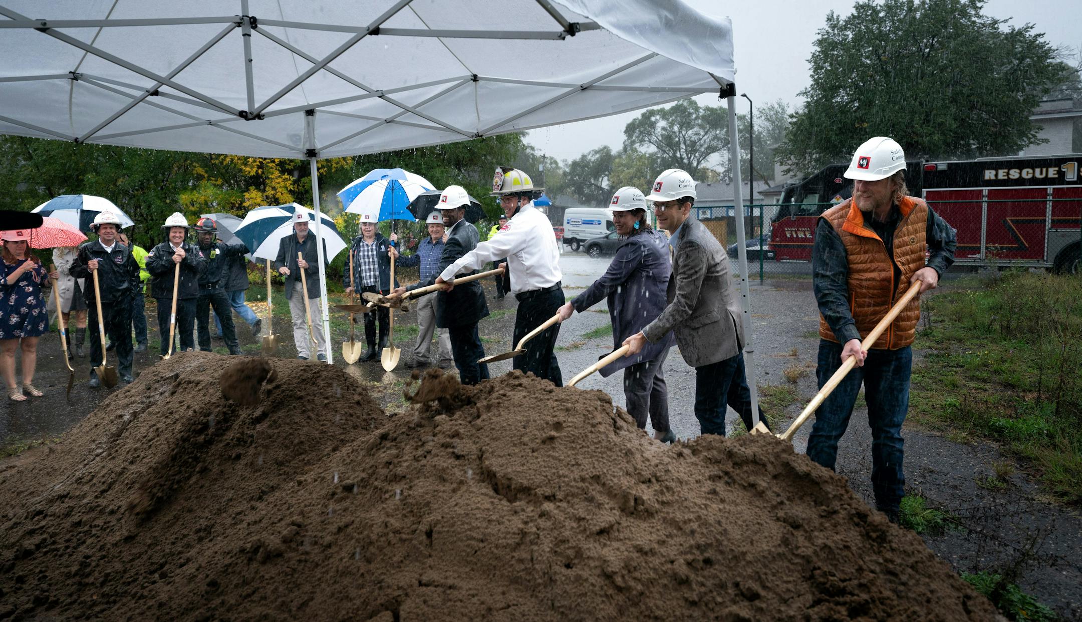 In the pouring rain, St. Paul city officials, led the ground breaking ceremony for the new Station 7.