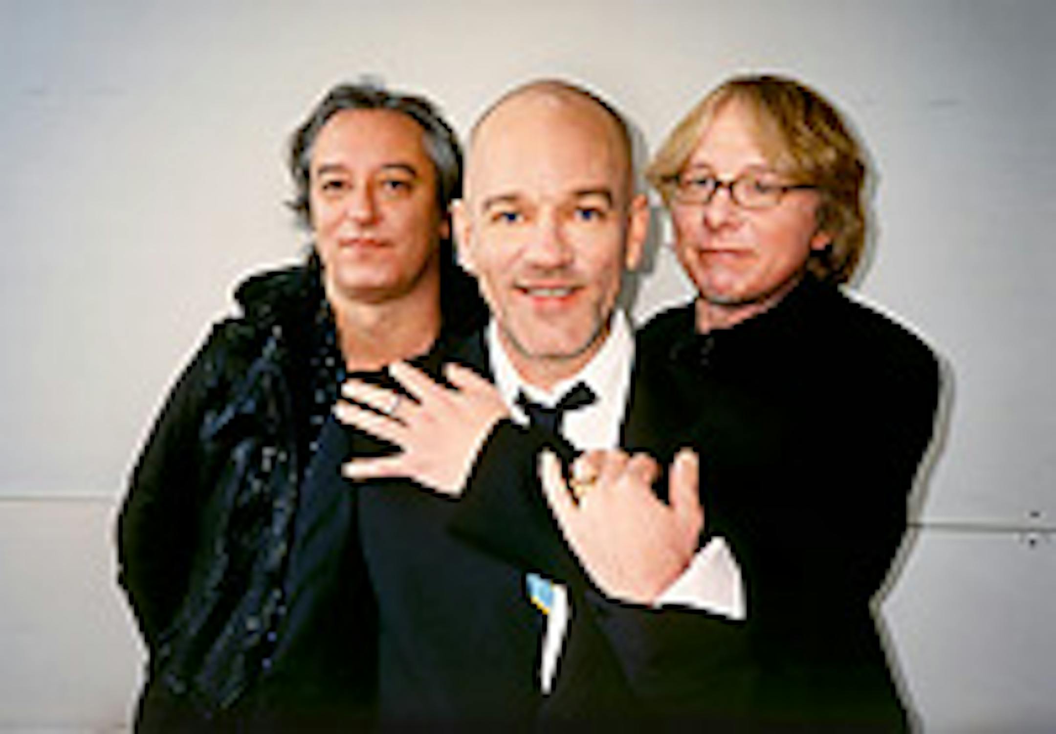 Peter Buck, left, Michael Stipe and Mike Mills of R.E.M.
