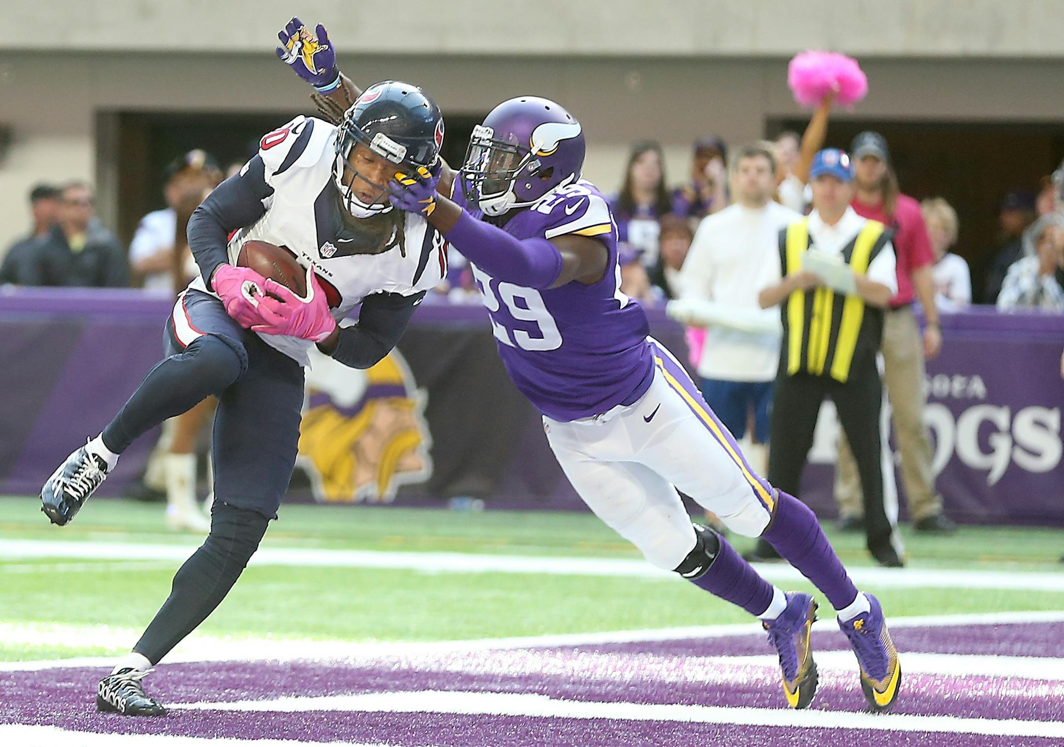 Houston Texans wide receiver DeAndre Hopkins caught the ball in the end zone for a touchdown despite pressure by Minnesota Vikings cornerback Xavier Rhodes during the fourth quarter as the Vikings took on the Houston Texans at US Bank Stadium, Sunday, October 9, 2016 in Minneapolis, MN.