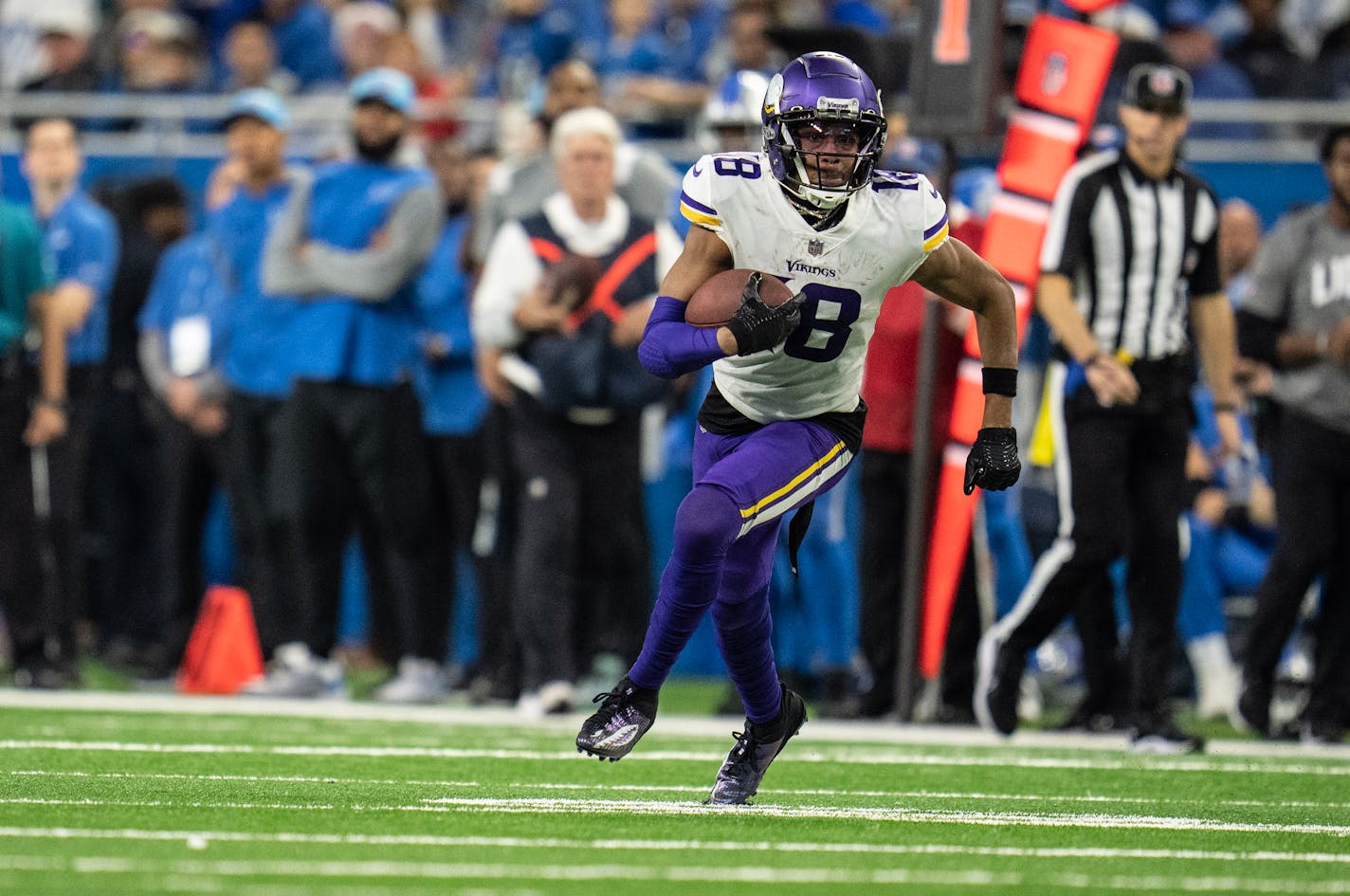 Minnesota Vikings wide receiver Justin Jefferson (18) picked up a first down in the first quarter In Detroit , Mich. Sunday December 11, 2022. ] JERRY HOLT • jerry.holt@startribune.com