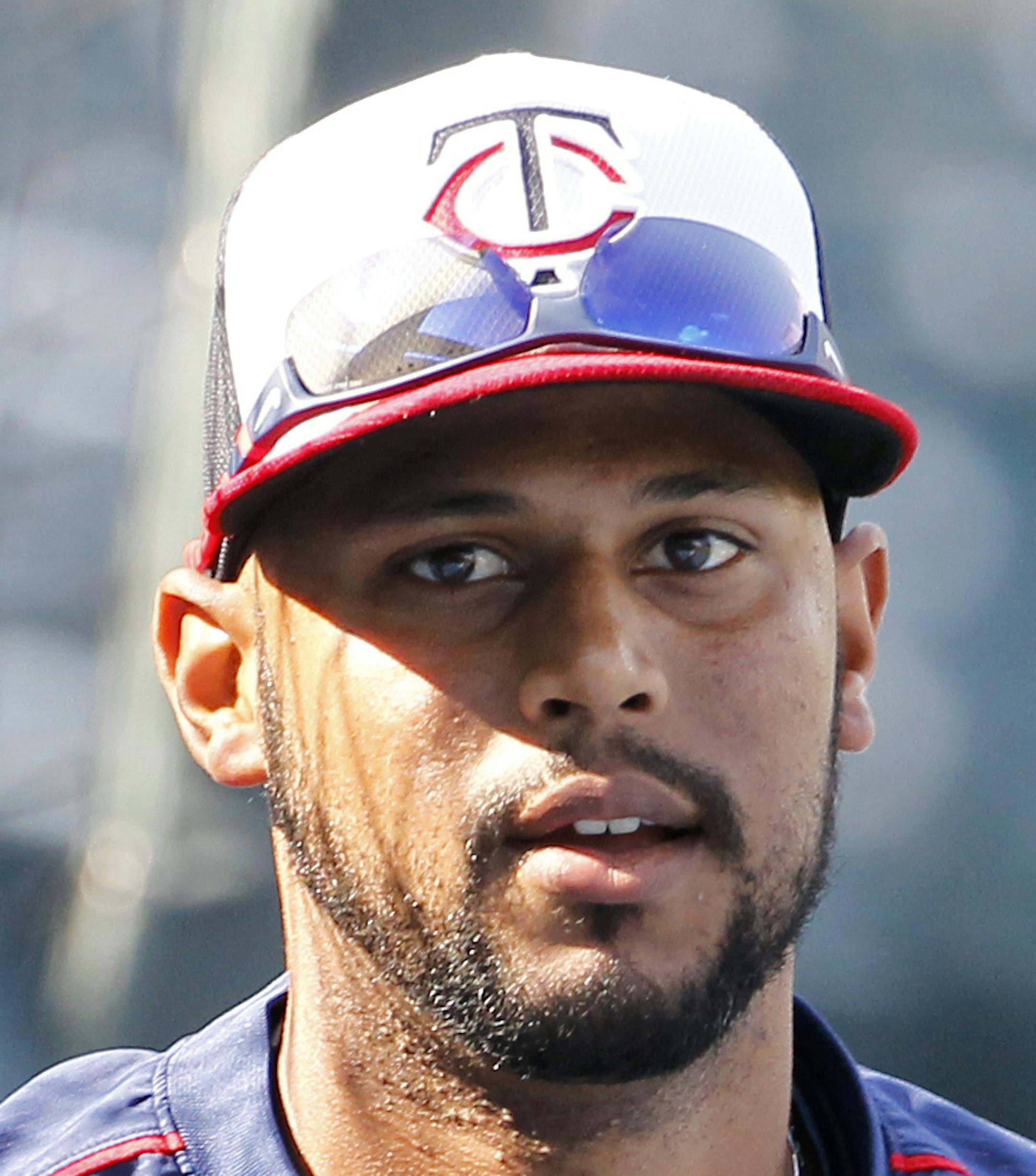 Minnesota Twins center fielder Aaron Hicks steps out of the batting cage before a baseball game against the Detroit Tigers in Minneapolis, Thursday, July 9, 2015. (AP Photo/Ann Heisenfelt)