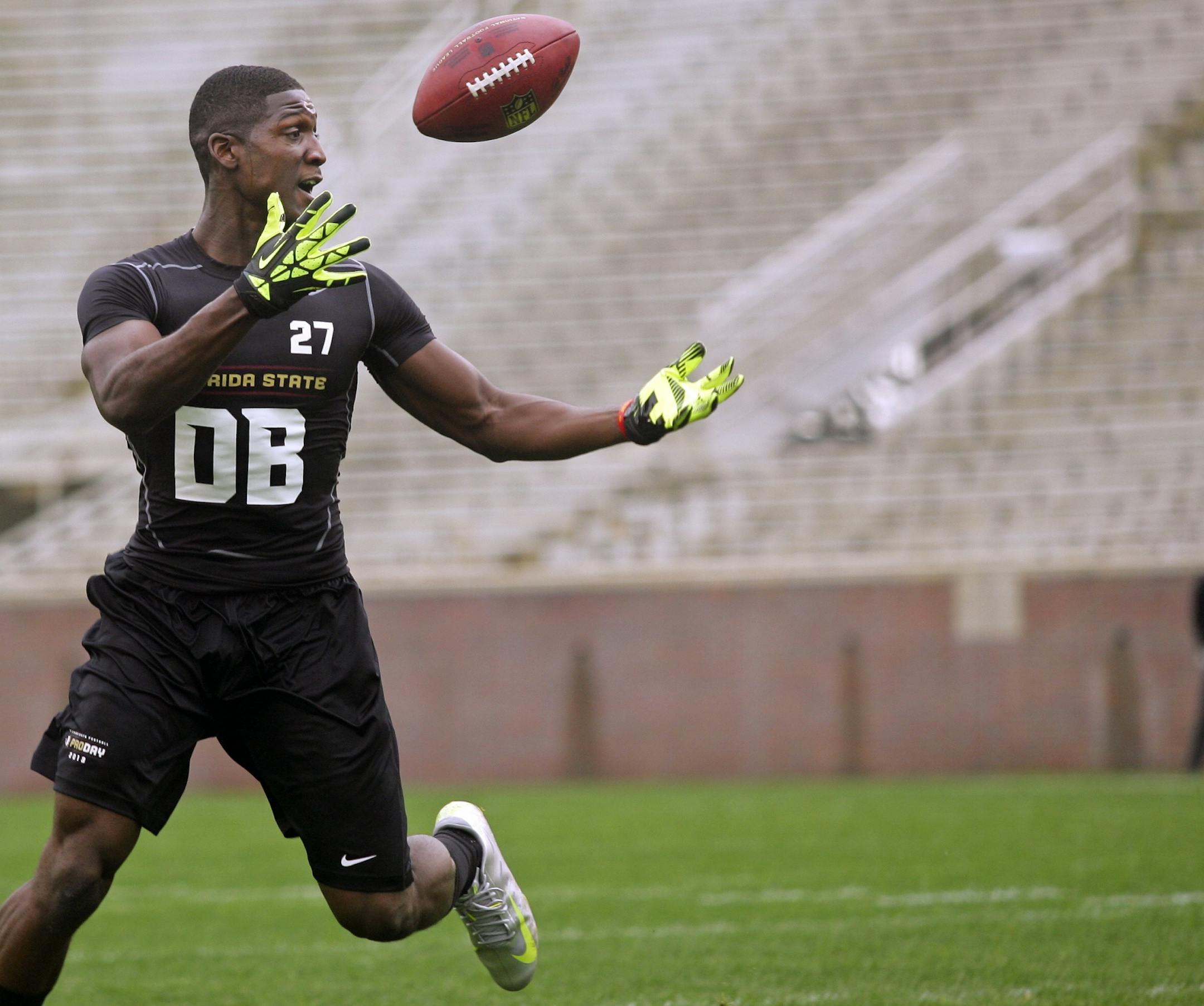 Xavier Rhodes catches a pass during an agility drill at pro day at Florida State University Tuesday, March 19, 2013, in Tallahassee, Fla.