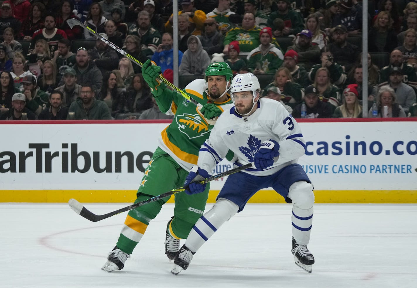 Minnesota Wild right wing Ryan Reaves (75) battles for position in front of the net with Toronto Maple Leafs defenseman Timothy Liljegren (37) in the second period against the Toronto Maple Leafs at the Xcel Energy Center in Saint Paul, Minn., on Friday, Nov. 25, 2022. ] SHARI L. GROSS • shari.gross@startribune.com