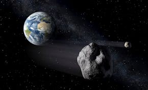 In this artistic rendering, two asteroids fly past Earth. An asteroid will whiz harmlessly past Earth Saturday June 29, 2024. With the right equipment