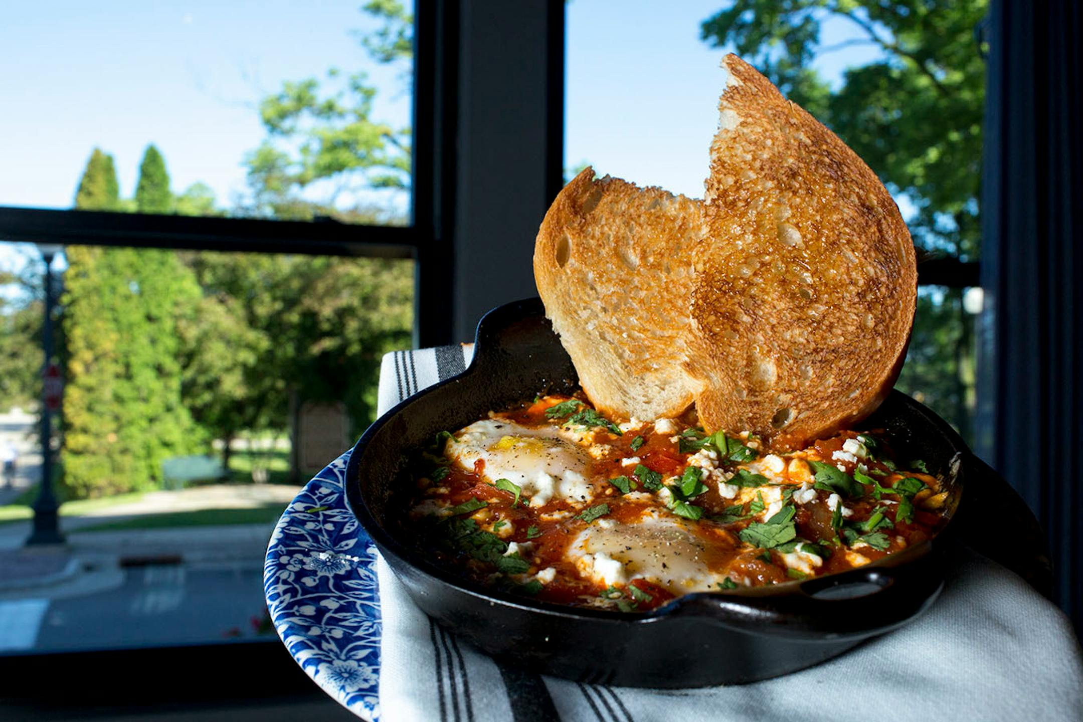 Shakshuka is served at the Charmant Hotel's breakfast with tomato, pepper, feta, cilantro, egg and cumin. ] COURTNEY PEDROZA • courtney.pedroza@startribune.com June 22-24, 2017; Wisconsin restaurants, cafes, bars, bakeries and breweries; Dining along the Mississippi River.