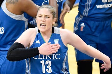 Minnesota Lynx guard Lindsay Whalen (13) pounded her chest in celebration after drawing a shooting foul in the first quarter against the Los Angeles S