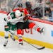 Minnesota Wild defenseman Dmitry Kulikov (29) battles for the puck with Chicago Blackhawks center Jonathan Toews (19) during the second period of an N