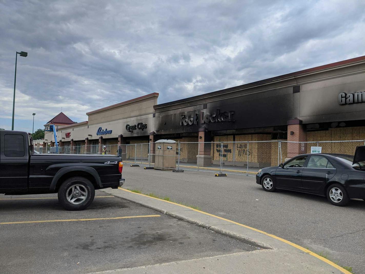 Midway Shopping Center, after being damages in the unrest following the George Floyd killing, is closing, leaving some of its tenants with few choices. (NICOLE NORFLEET/Star Tribune)