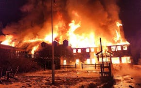 Flames engulfed the Lutsen Lodge early Tuesday morning after a fire broke out on the property in Lutsen.