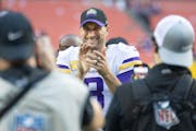 Minnesota Vikings quarterback Kirk Cousins (8) celebrates the 20-17 victory over the Washington Commanders at FedEx Field, in Landover, MD, on Sunday,