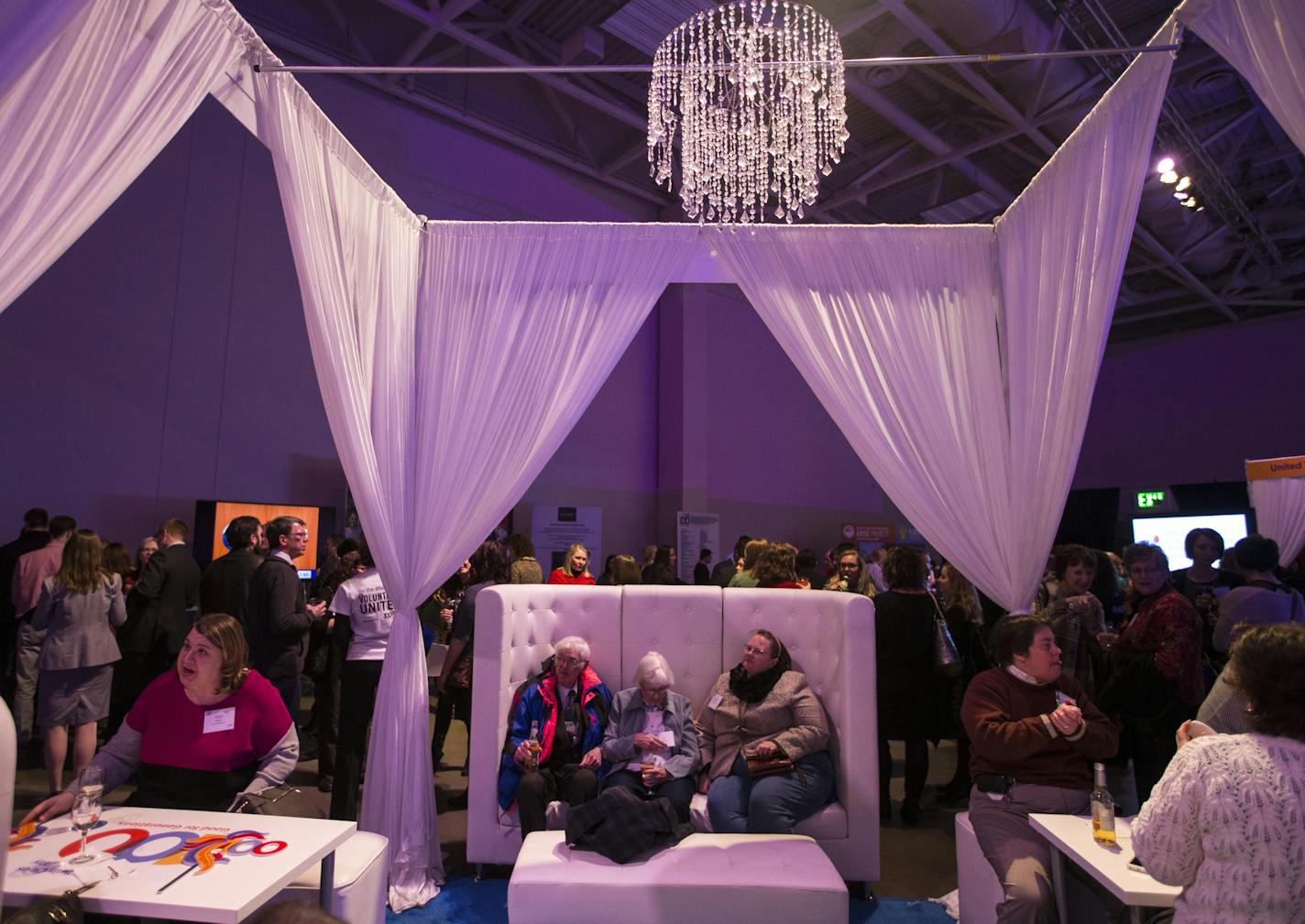 Guests sat in loungers at the United Way centennial celebration at the Minneapolis Convention Center in Minneapolis, Minn., on Thursday, February 19, 2015. ] RENEE JONES SCHNEIDER &#x2022; reneejones@startribune.com