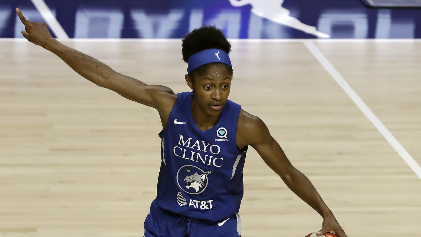 Minnesota Lynx guard Crystal Dangerfield (2) during the first half of a WNBA basketball game against the Chicago Sky Thursday, July 30, 2020, in Bradenton, Fla. (AP Photo/Chris O'Meara)