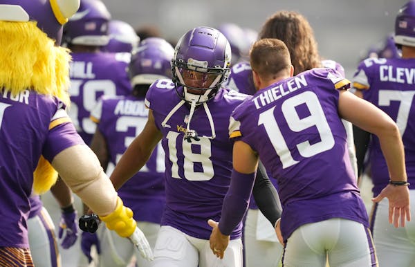 Vikings receivers Justin Jefferson (18) and Adam Thielen rested Wednesday.