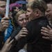A pro-Russian protester who was detained is embraced after being released from a police station after the building was stormed in Odessa, Ukraine, May