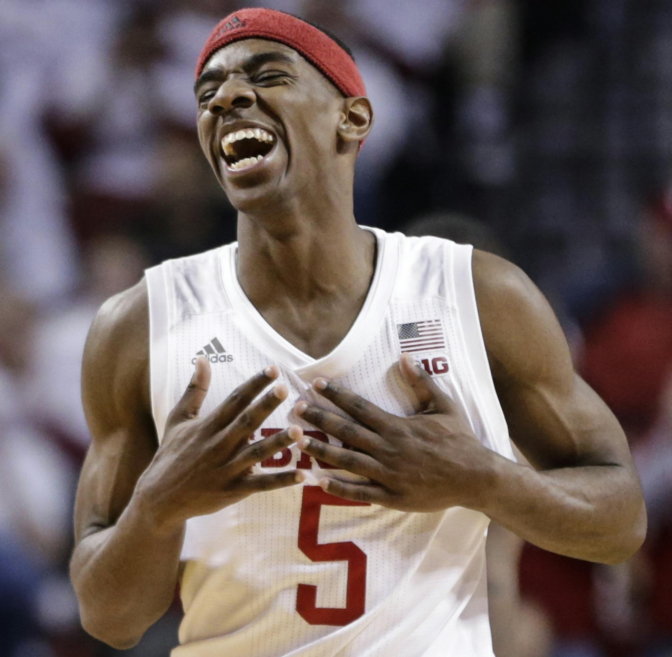 Nebraska's Glynn Watson Jr. (5) laughs with teammate James Palmer Jr. (24), after scoring a basket off a steal during the second half of an NCAA college basketball game against Minnesota in Lincoln, Neb., Tuesday, Dec. 5, 2017. Nebraska won 78-68. (AP Photo/Nati Harnik)