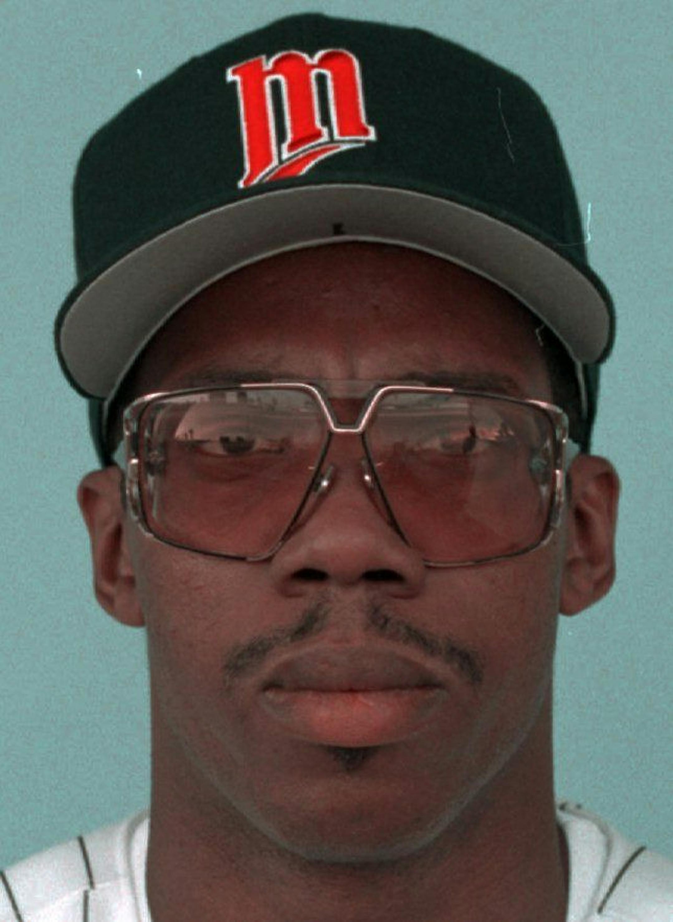 FILE -- Minnesota center fielder Alex Cole, shown in this 1995 phloto, broke his right leg chasing a base hit in the eighth inning Tuesday night, May 30, ,1995 and was taken from the field strapped to a stretcher.