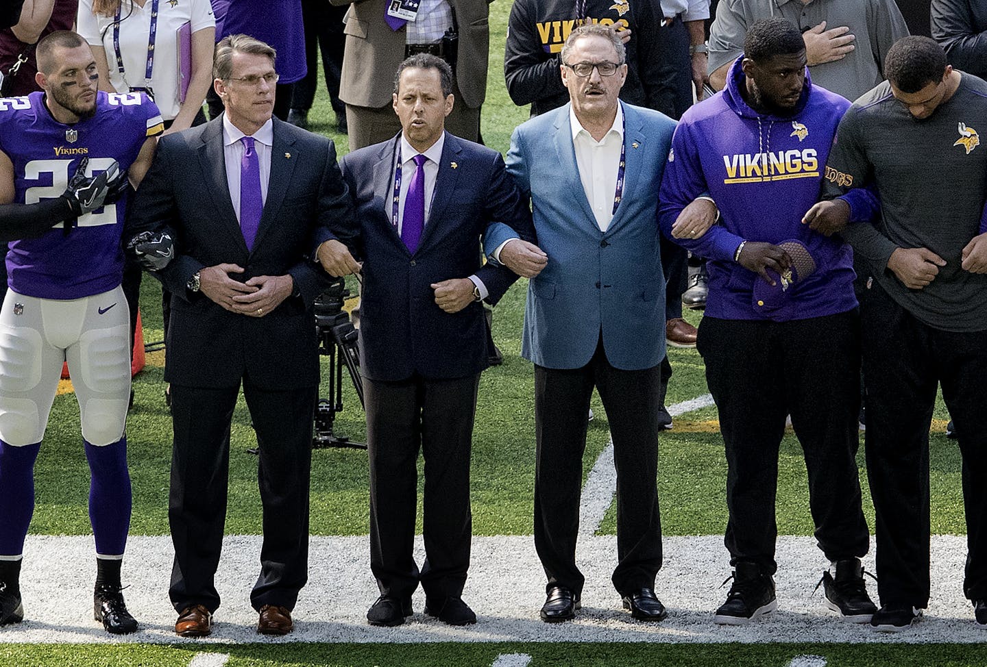 Minnesota Vikings general manager Rick Spielman, owners Mark Wilf and Zygi Wilf stood with players Harrison Smith (22) (left) during the National Anthem before the start of a game vs. the Tampa Bay Buccaneers at US Bank Stadium. ] CARLOS GONZALEZ &#xef; cgonzalez@startribune.com - September 24, 2017, Minneapolis, MN, NFL, US Bank Stadium, Minnesota Vikings vs. Tampa Bay Buccaneers