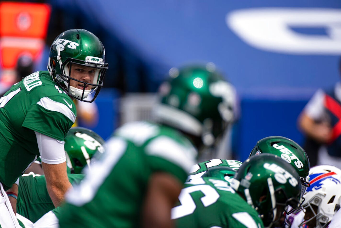 New York Jets quarterback Sam Darnold (14) readies under center during the first quarter against the Buffalo Bills, Sunday, Sept. 13, 2020, in Orchard Park, N.Y. (AP Photo/Brett Carlsen)