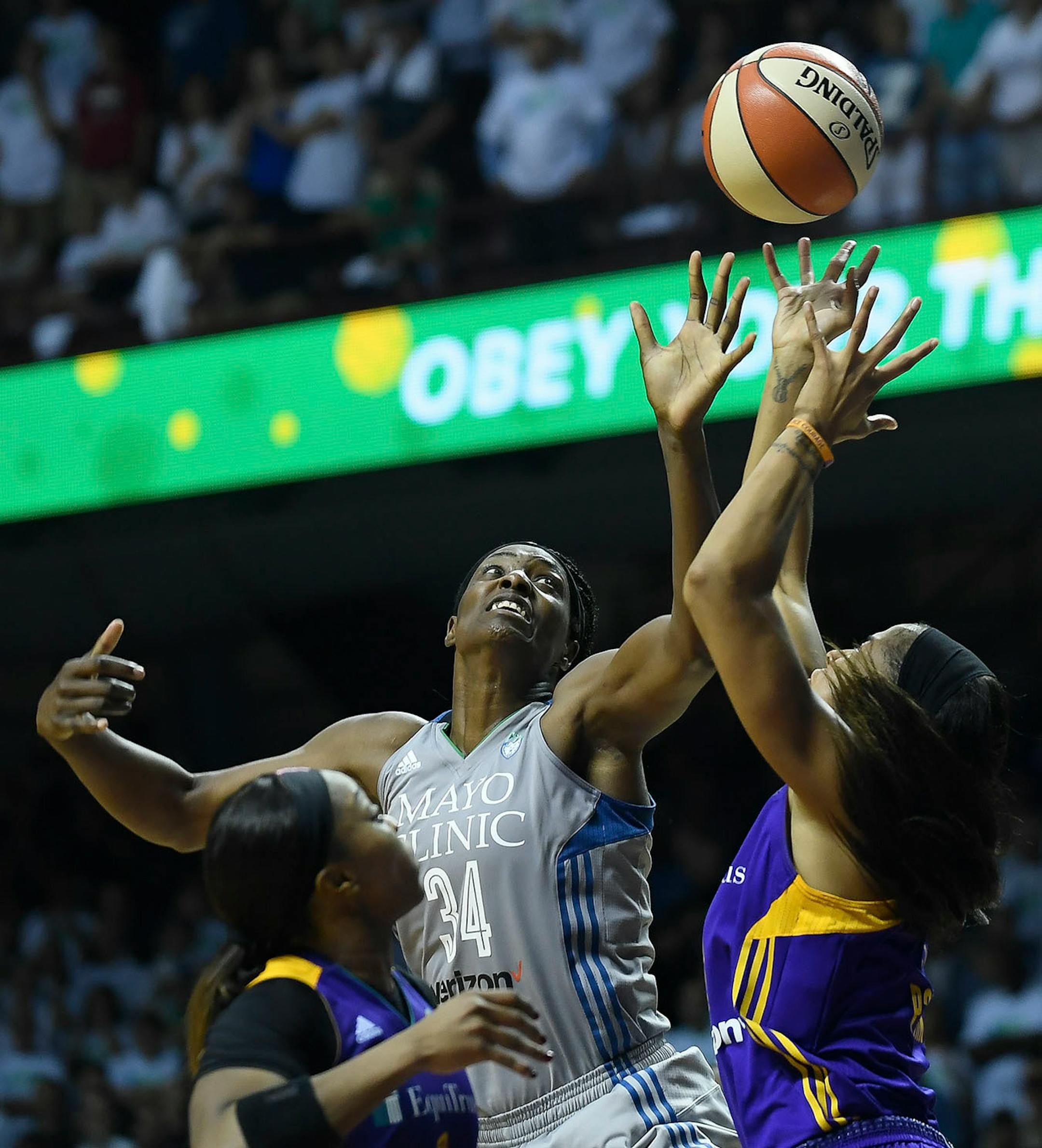 Minnesota Lynx center Sylvia Fowles (34) was fouled by Los Angeles Sparks forward Candace Parker (3) in the fourth quarter.
