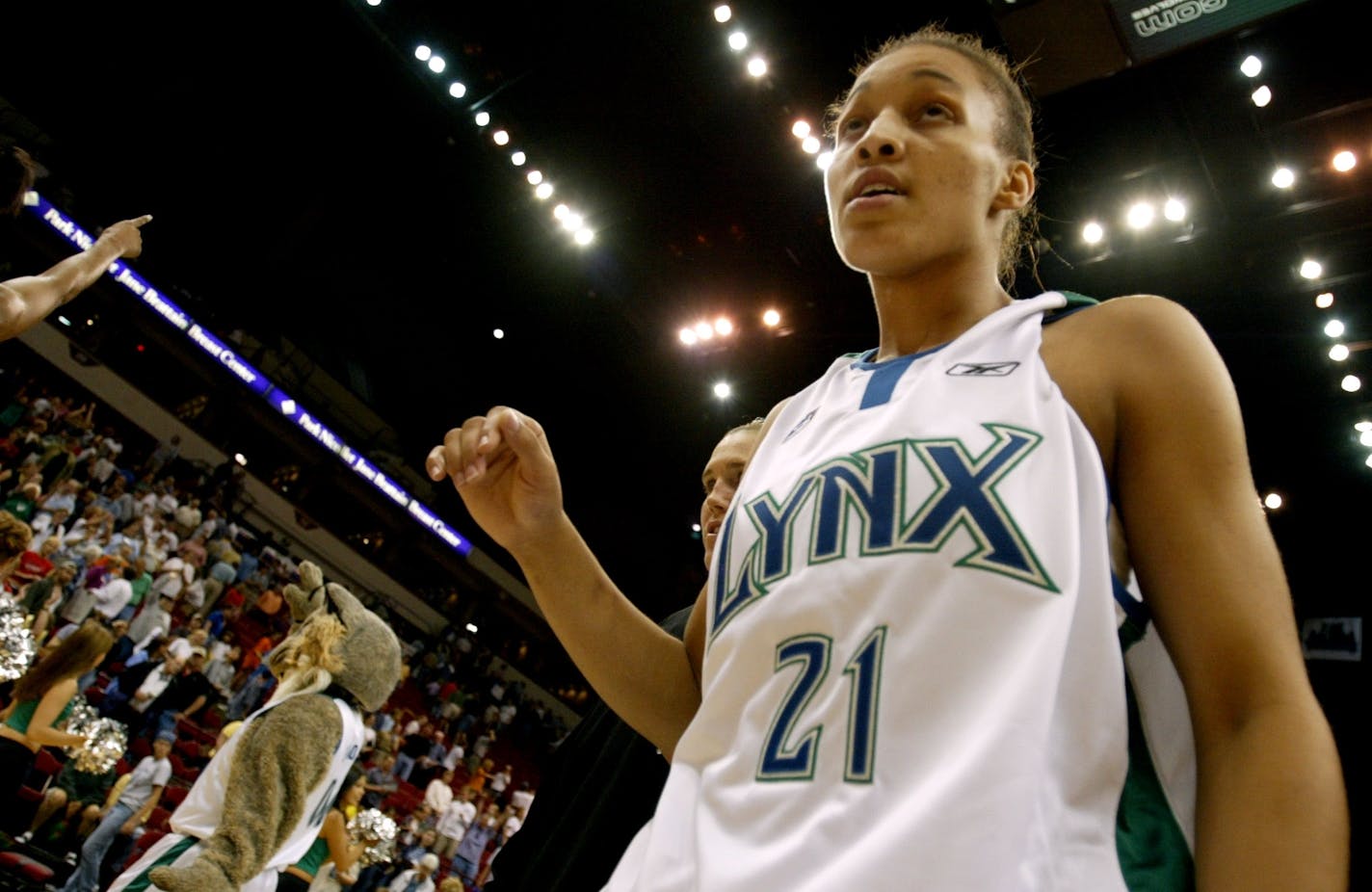 June 13, 2002 Minneapolis, MN- The Target Center Minnesota Lynx vs. Portland Fire Minnesotaís Tamara Moore, #21, walks off the court after of Thursday nightís game. The Lynx beat the Fire by a final score of 60-46.