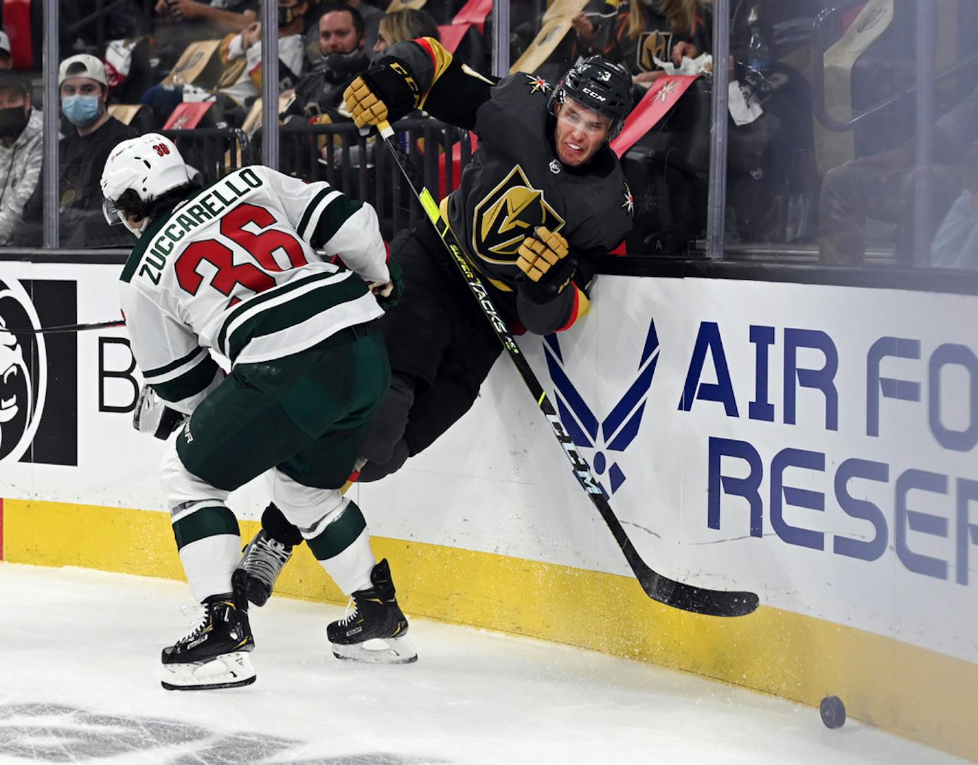 Minnesota Wild right wing Mats Zuccarello (36) hits Vegas Golden Knights defenseman Brayden McNabb (3) on Sunday.