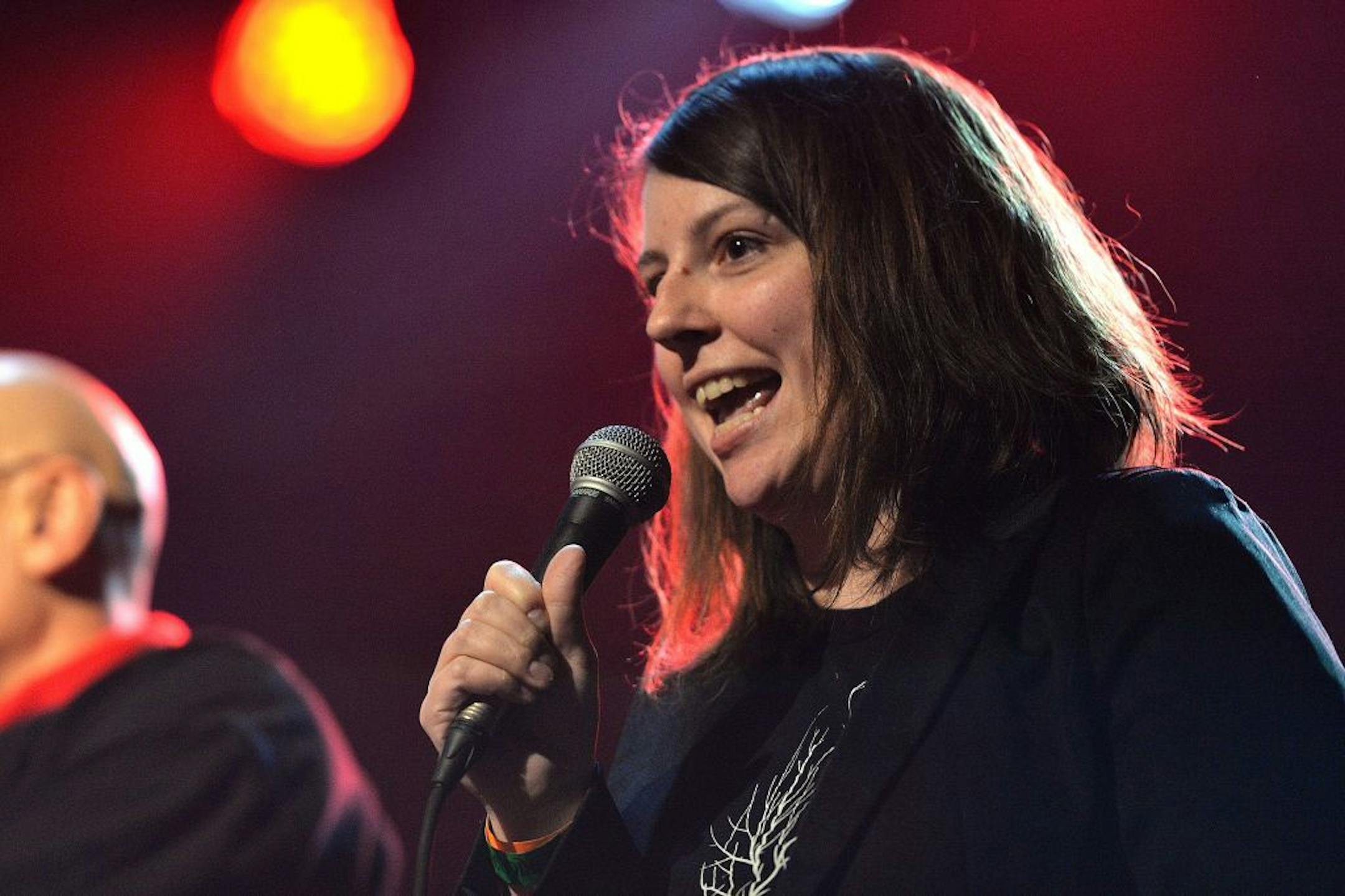 The Current's music reporter and host, Andrea Swensson, takes the stage between musical acts Saturday night during the second half of the Current's eleventh birthday bash at First Avenue's main room.