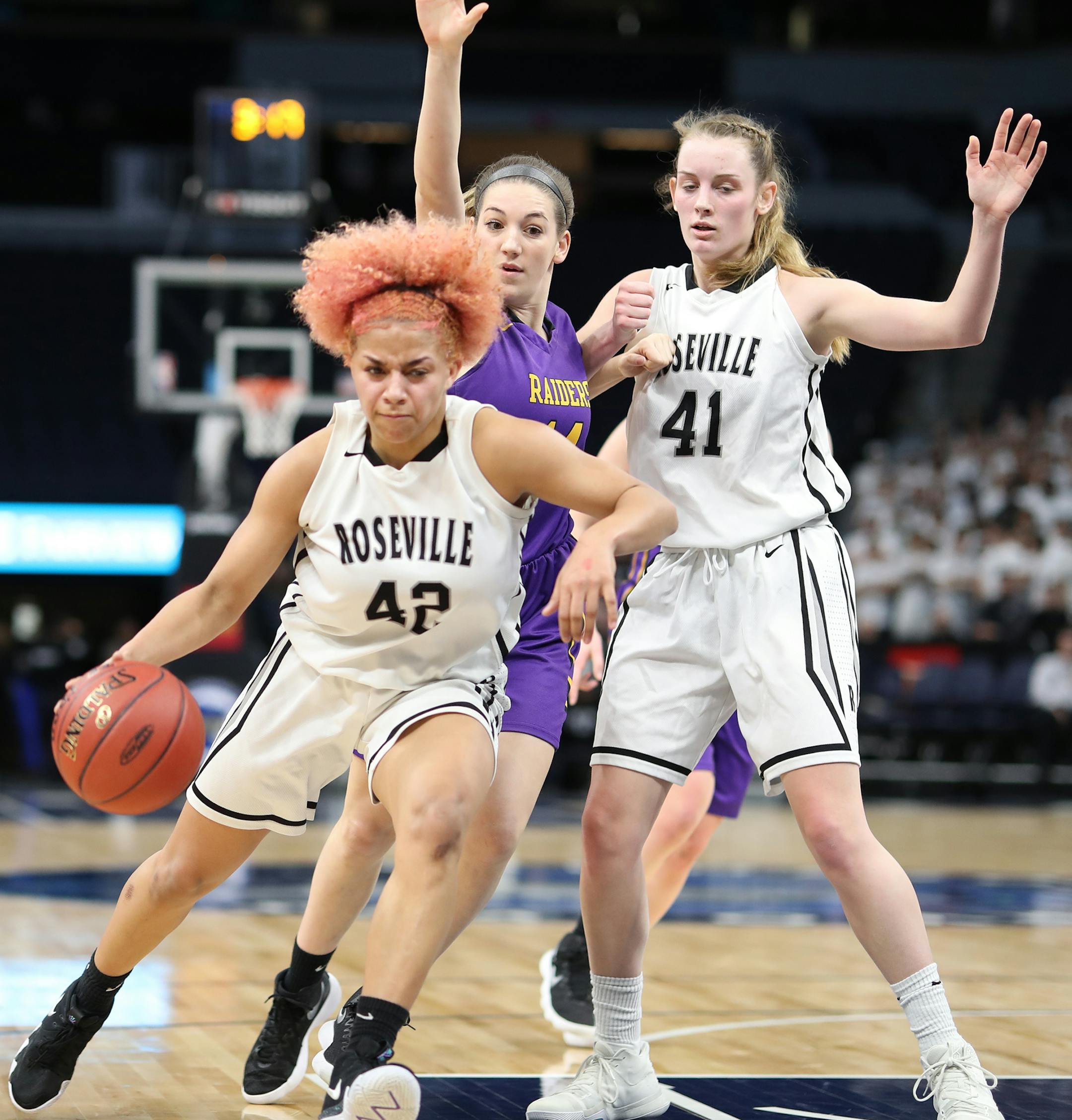 Roseville Area High School guard Jada Hood (42) drives the ball during the first half. ] LEILA NAVIDI ï leila.navidi@startribune.com BACKGROUND INFORMATION: Roseville Area High School plays against Cretin-Derham Hall High School in the class 4A quarterfinals of the state girls basketball tournament at Target Center in Minneapolis on Wednesday, March 14, 2018.